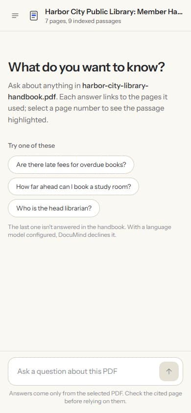 DocuMind on a phone: the sample handbook open, with suggested questions